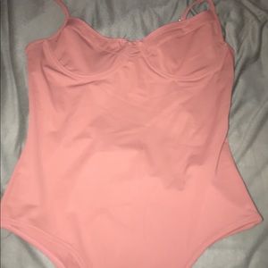 Pink bodysuit